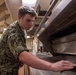 USS John C. Stennis (CVN 74) Sailor Conducts Maintenance