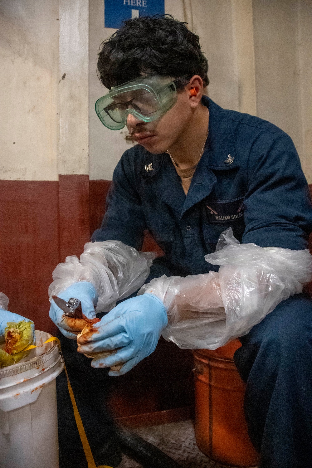 USS John C. Stennis (CVN 74) Sailor Conducts Maintenance