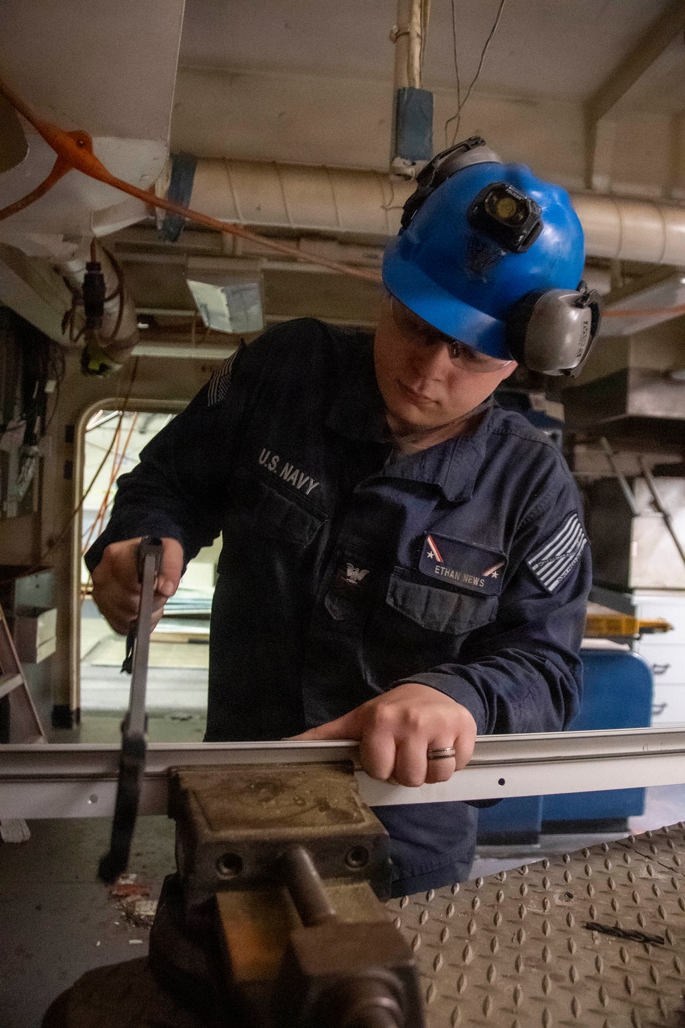 USS John C. Stennis (CVN 74) Sailor Conducts Maintenance