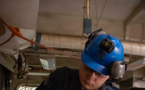 USS John C. Stennis (CVN 74) Sailor Conducts Maintenance