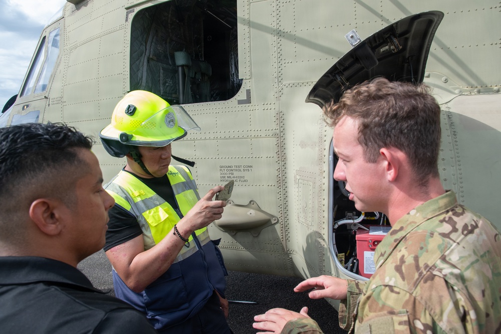 Panamanian firefighters receive CH-47 orientation during PANAMAX26
