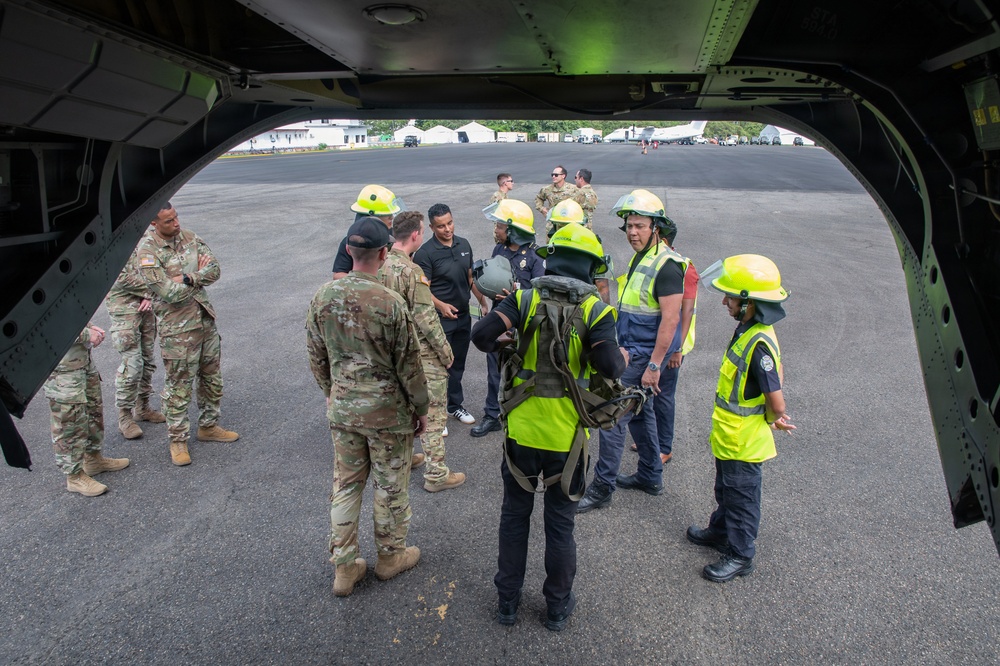 Panamanian firefighters receive CH-47 orientation during PANAMAX26