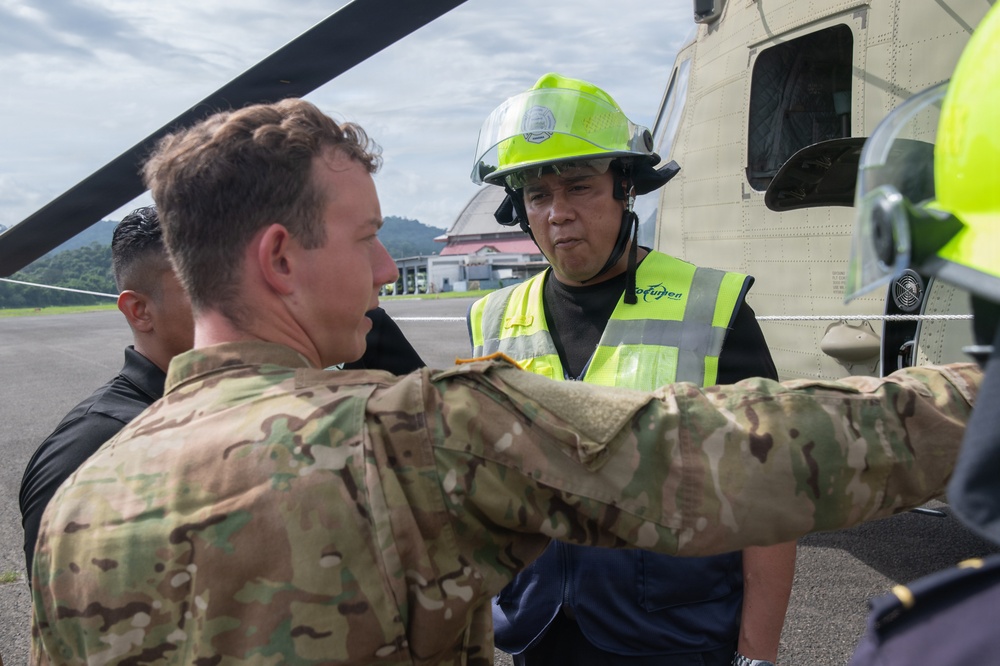 Panamanian firefighters receive CH-47 orientation during PANAMAX26