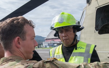 Panamanian firefighters receive CH-47 orientation during PANAMAX26