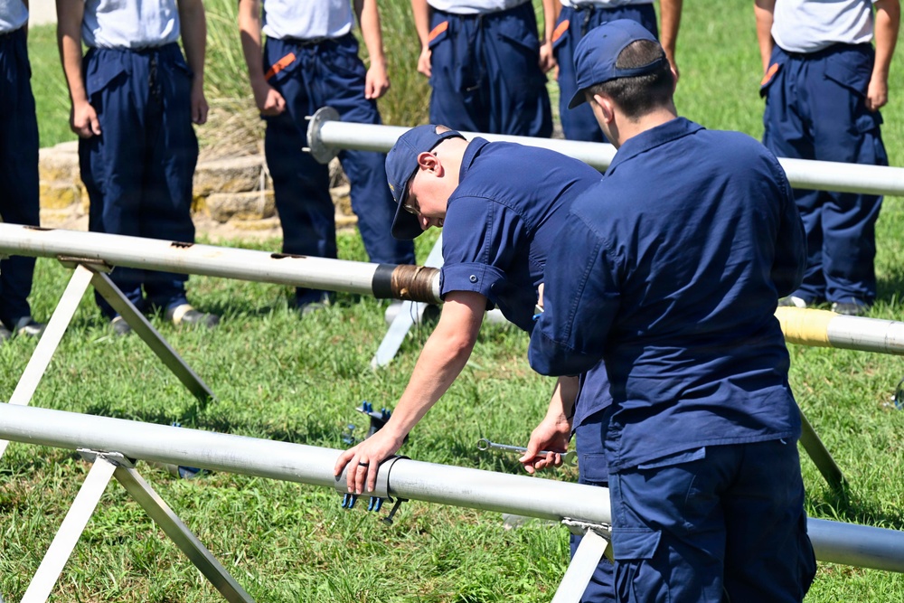 Training Center Cape May Instructors Teach Damage Control Pipe Patching Training