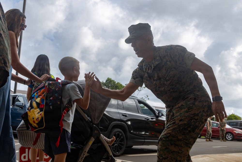 U.S. Marines Welcome Students Back to School at MCBH