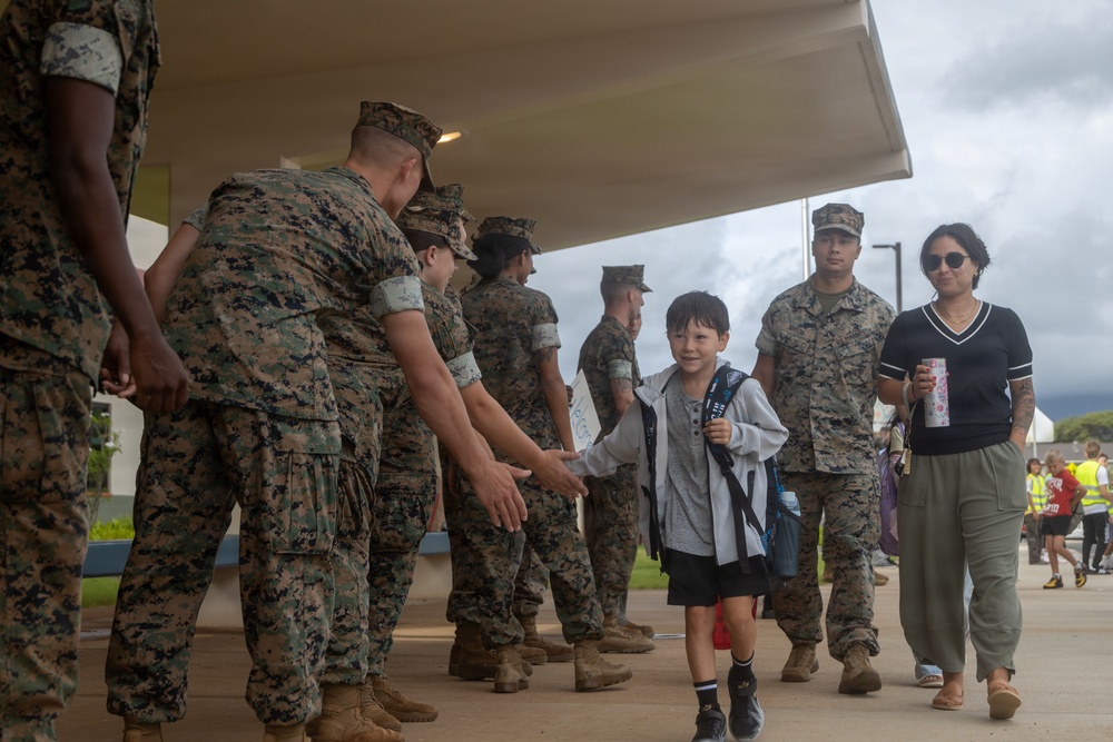 U.S. Marines Welcome Students Back to School at MCBH