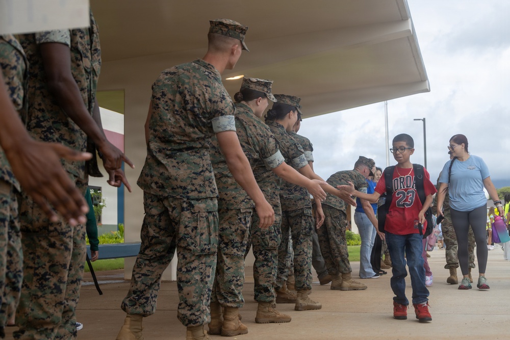 U.S. Marines Welcome Students Back to School at MCBH