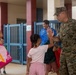 U.S. Marines Welcome Students Back to School at MCBH