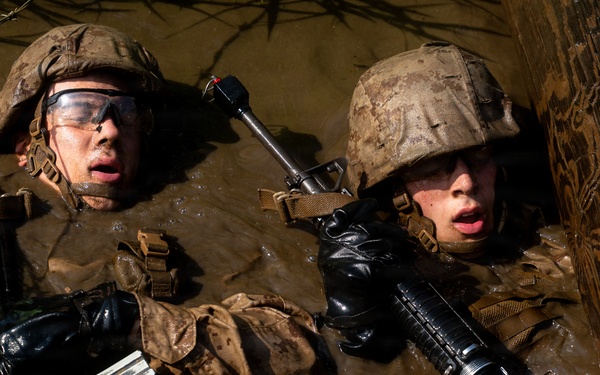 U.S. Marine Corps Officer Candidates Complete the Combat Course
