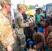 .S. Army Soldiers donate toys, musical instruments, and literature material to the youth of a local village during Tamiok Strike 26