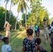 U.S. Army Soldiers donate toys, musical instruments, and literature material to the youth of a local village during Tamiok Strike 26
