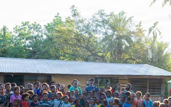 U.S. Army Soldiers donate toys, musical instruments, and literature material to the youth of a local village during Tamiok Strike 26