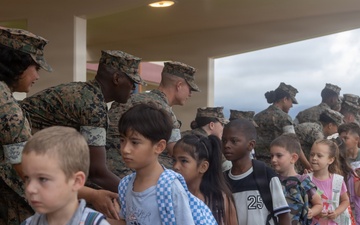 U.S. Marines Welcome Students Back to School at MCBH