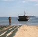 Causeway ferry approaches the beach