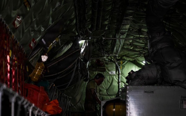 KC135 refuels F16s during routine patrol