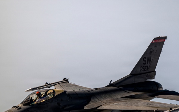KC135 refuels F16s during routine patrol