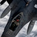 KC135 refuels F16s during routine patrol