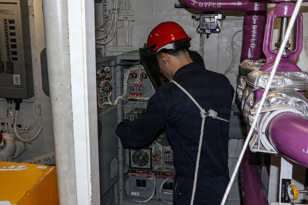 Frank E. Petersen Jr. Sailor Conducts Maintenance