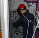 Frank E. Petersen Jr. Sailor Conducts Maintenance