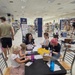 Military families participate in back-to-school festivities at their local NEX