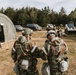 Airmen from the 131st Civil Engineer Squadron and the 139th Civil Engineer Squadron perform tasks in MOPP gear