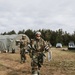 Airmen from the 131st Civil Engineer Squadron and the 139th Civil Engineer Squadron perform tasks in MOPP gear