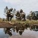 Airmen from the 131st Civil Engineer Squadron and the 139th Civil Engineer Squadron perform tasks in MOPP gear