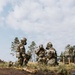 Airmen from the 131st Civil Engineer Squadron and the 139th Civil Engineer Squadron perform tasks in MOPP gear