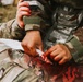 Airmen from the 131st Civil Engineer Squadron and the 139th Civil Engineer Squadron perform tasks in MOPP gear