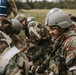 Airmen from the 131st Civil Engineer Squadron and the 139th Civil Engineer Squadron perform tasks in MOPP gear