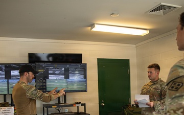 U.S. Army Soldiers conduct training with a HMMWV equipped with an M240B machine gun