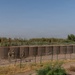 591st Engineer Company places Concertina Wire on top of HESCO barriers at NDA 2