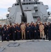 Captain Mary Hays, Commanding Officer, USS Ted Stevens (DDG 128), promotes Weapons Officer, LT Zachary Wasson, to the rank of Lieutenant Commander.