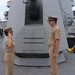 Captain Mary Hays, Commanding Officer, USS Ted Stevens (DDG 128), promotes Weapons Officer, LT Zachary Wasson, to the rank of Lieutenant Commander.