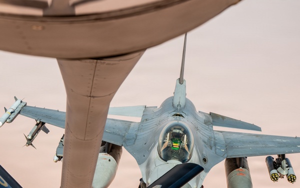 KC-135 refuels F16s for theater stability