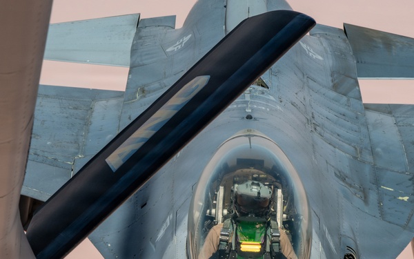 KC-135 refuels F16s for theater stability
