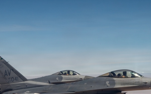 KC-135 refuels F16s for theater stability