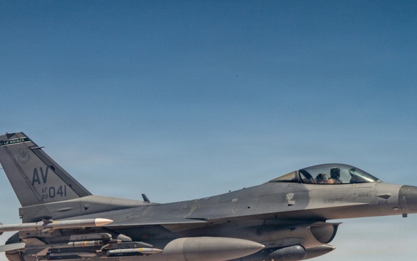 KC-135 refuels F16s for theater stability