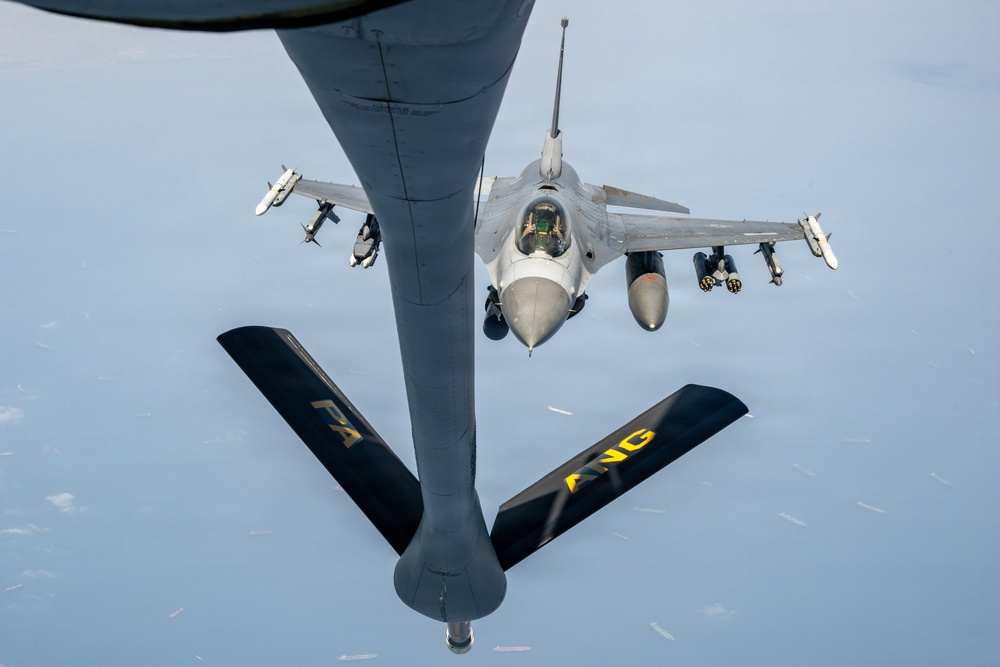 KC-135 refuels F16s for theater stability