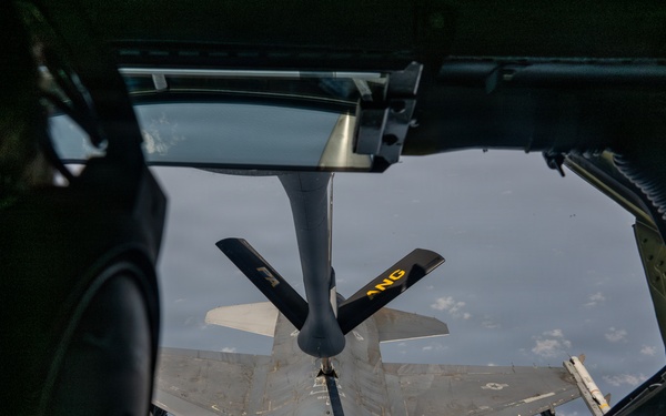 KC-135 refuels F16s for theater stability