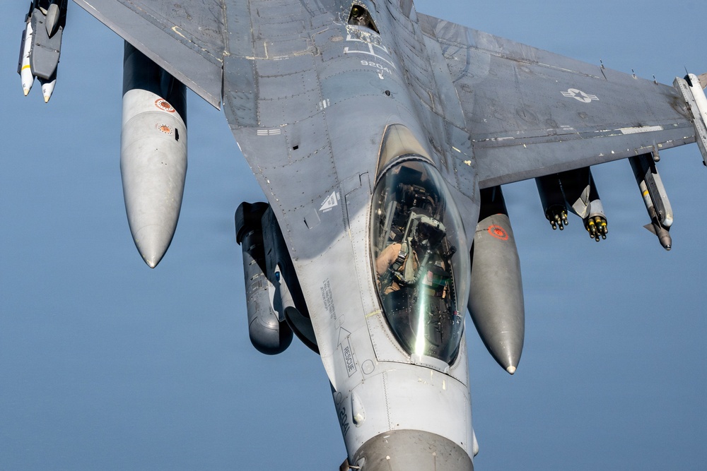 KC-135 refuels F16s for theater stability