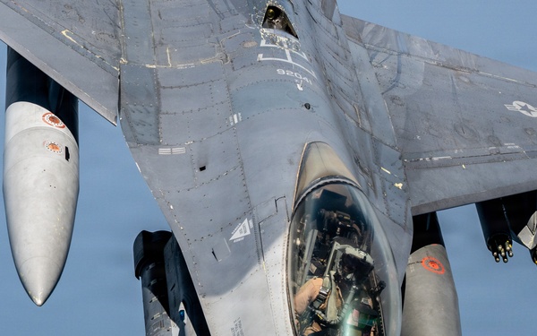 KC-135 refuels F16s for theater stability