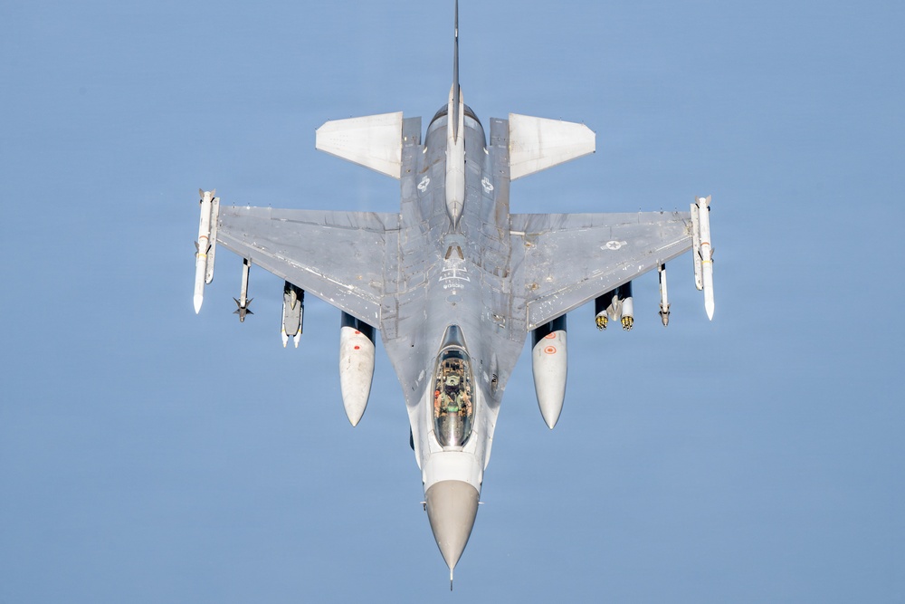 KC-135 refuels F16s for theater stability