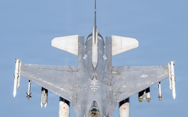 KC-135 refuels F16s for theater stability