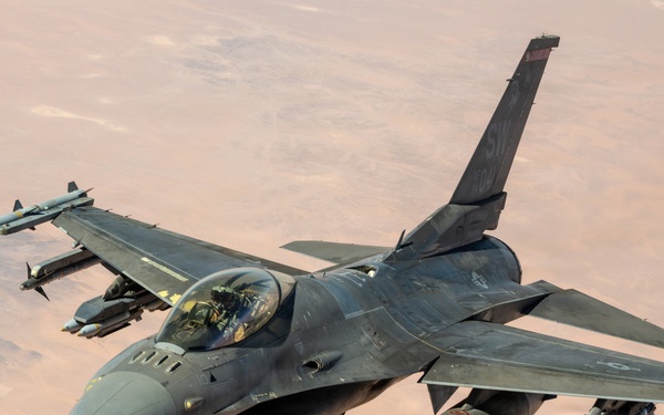 KC-135 refuels F16s for regional stability