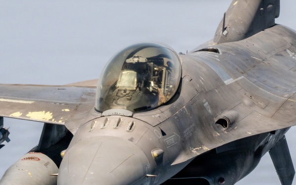 KC-135 refuels F16s for regional stability