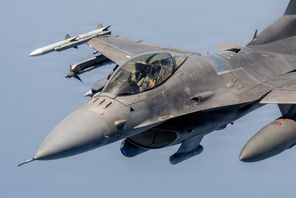 KC-135 refuels F16s for regional stability