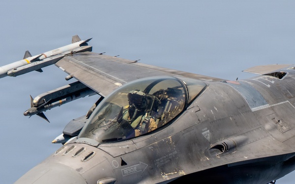 KC-135 refuels F16s for regional stability