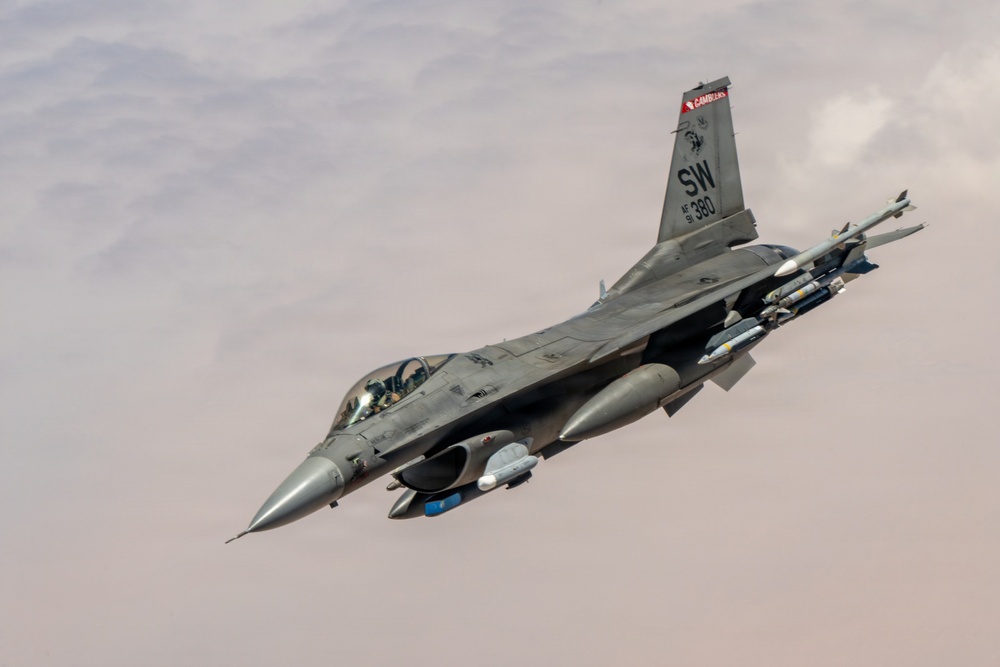 KC-135 refuels F16s for regional stability
